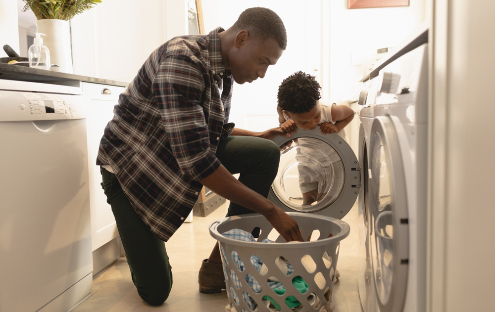 man doing laundry