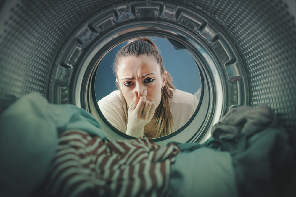 What causes odours in laundry?